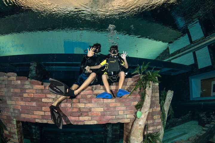 Dive into the world's deepest pool where you can explore unique underwater scenery and connect with the rich heritage of pearl diving in Dubai's stunning aquatic wonder.